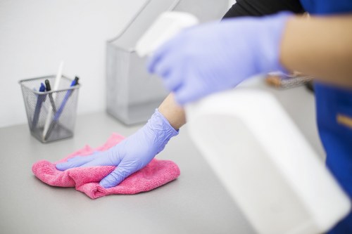 Cleaner inspecting equipment and maintaining a safe workspace