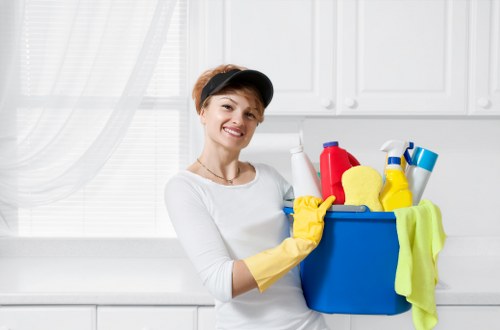 Cleaner in Chiswick preparing a tidy kitchen and worktops